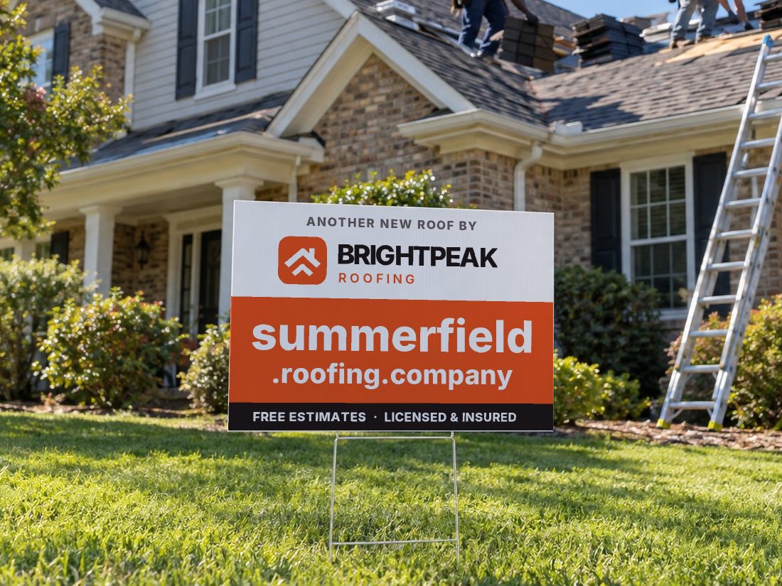 summerfield.roofing.company on a yard sign in front of a house getting a new roof